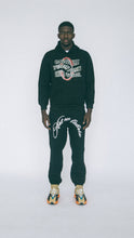 Load image into Gallery viewer, ART PIECE : ARCHED WHITE PLASTISOL RHINESTONES BORDER SWEATPANTS
